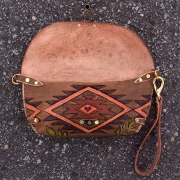 Cow skull clutch with navajo designs & wild roses, carved leather by Joren Eulalee Inside View