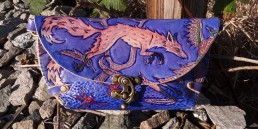 Fox clutch hunting pheasants in the fall, carved leather by Joren Eulalee Front