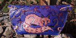 Fox clutch hunting pheasants in the fall, carved leather by Joren Eulalee Back